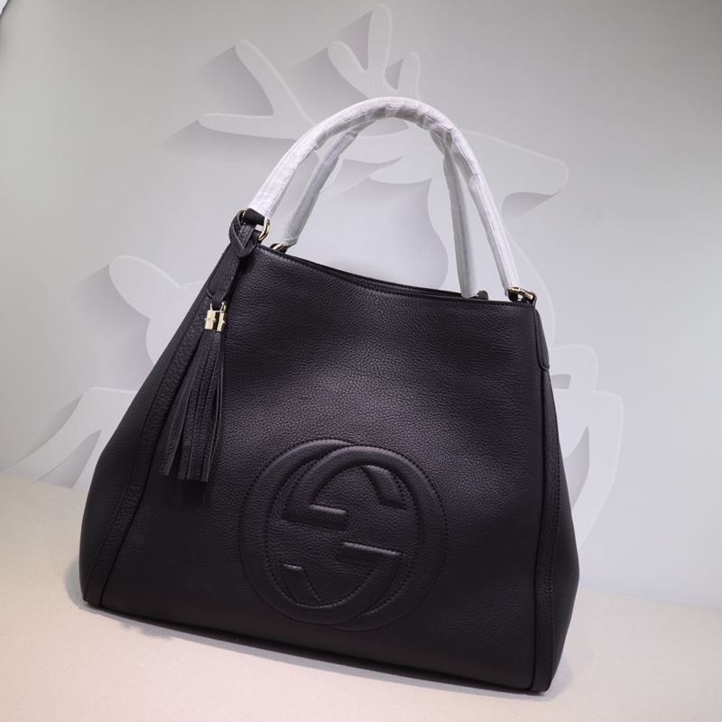 G*u*i shopping bags